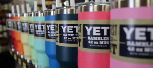 A variety of Yeti cups on a shelf