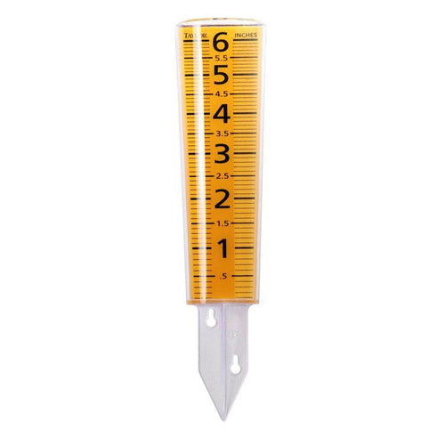 Yellow rain gauge with measurement scale on a white background