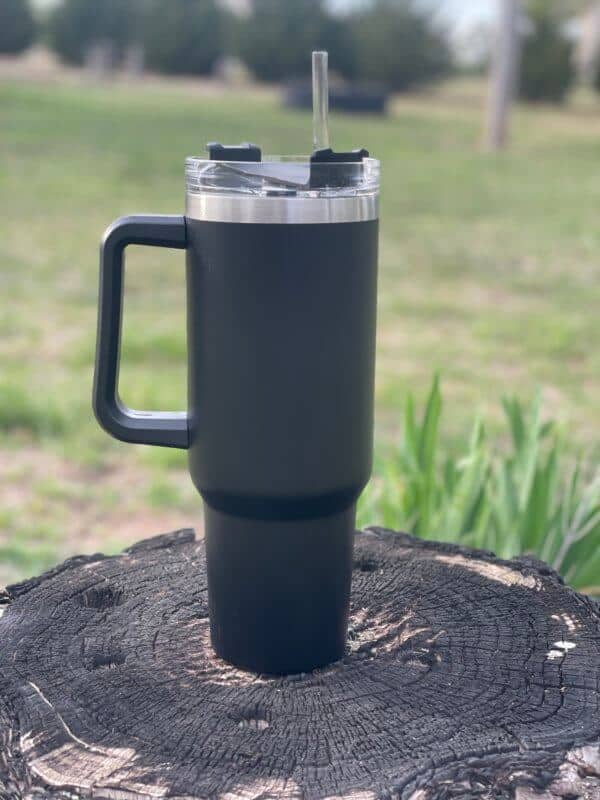 https://www.woodardmercantile.com/wp-content/uploads/2023/04/40-oz-handle-cup-black-outdoors-600x800.jpeg